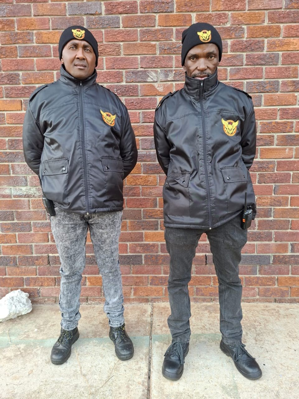 Two Bravo Delta uniformed security guards prepared for deployment